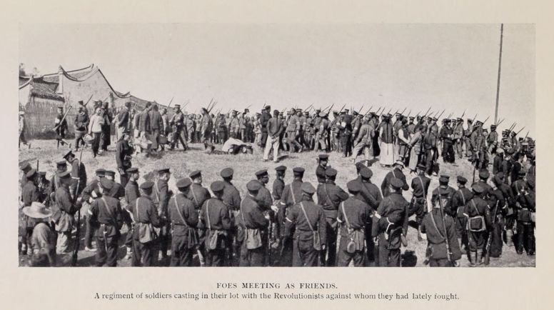 FOES MEETING AS FRIENDS. A regiment of soldiers casting in their lot with the Revolutionists against whom they had lately fought.