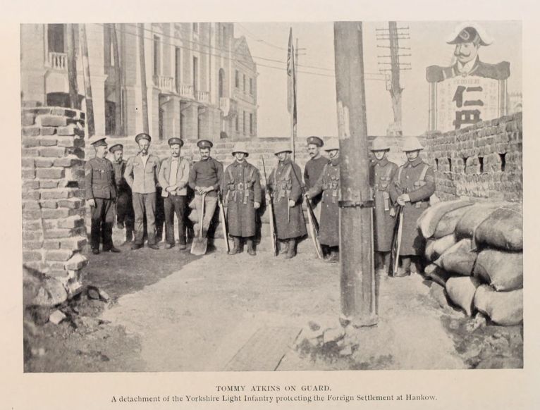 TOMMY ATKINS ON GUARD. A detachment of the Yorkshire Light Infantry protecting the Foreign Settlement at Hankow.