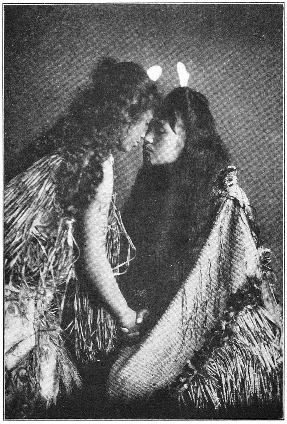 TWO MAORI GIRLS IN ANCIENT GREETING