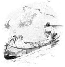 A man and two women in a small sailing boat