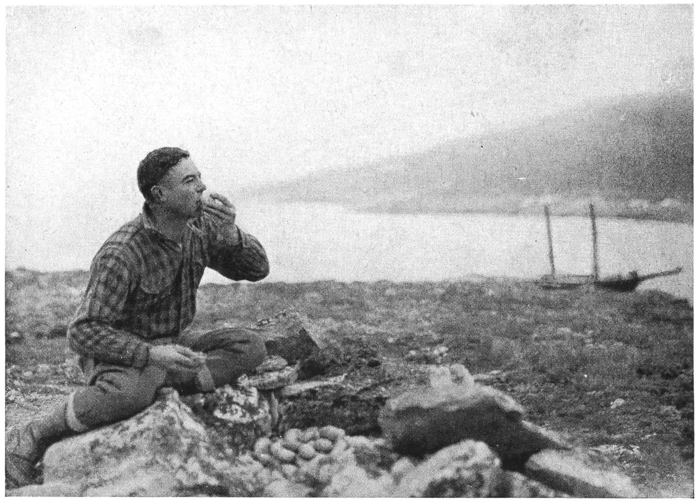 Art Young Tries an Eider Duck Egg from the Eskimo Cache on the Duck Islands.