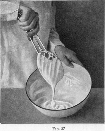 [Illustration: FIG. 27, Beating icing until light.]