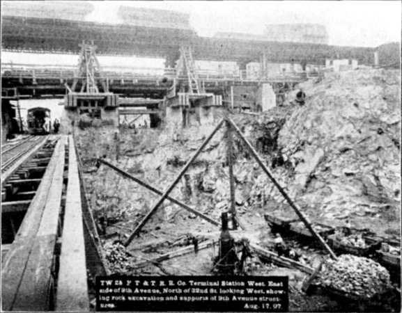 Plate XLVII, Fig. 4.— TW 28, P.T. & T.R.R. Co. Terminal Station West. East side of 9th Avenue, North of 32nd St. looking West, showing rock excavation and supports of 9th Avenue structures. Aug. 17, 07.