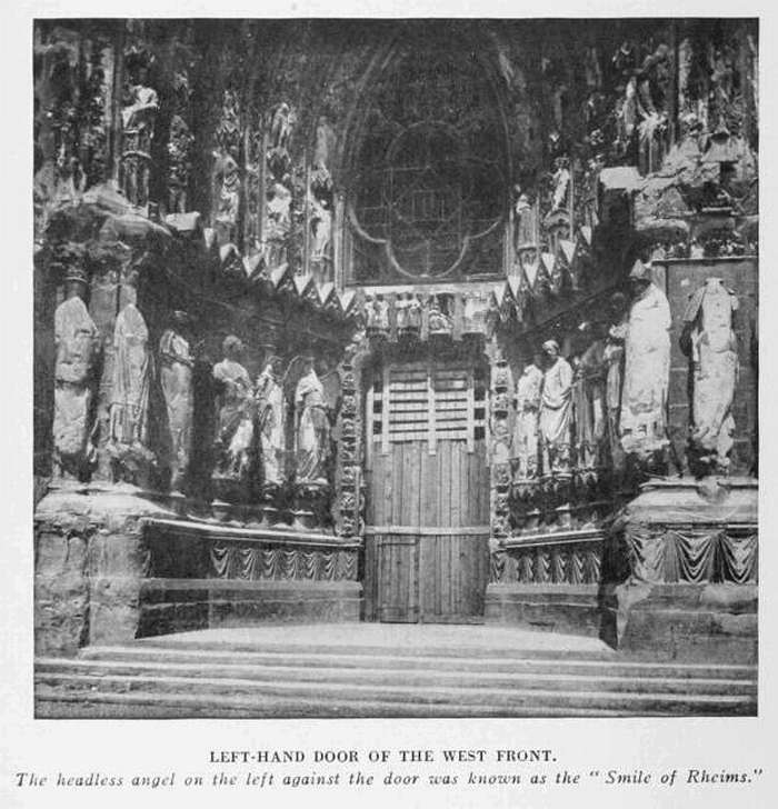 LEFT-HAND DOOR OF THE WEST FRONT
The headless angel on the left against the door was known as the "Smile of Rheims."