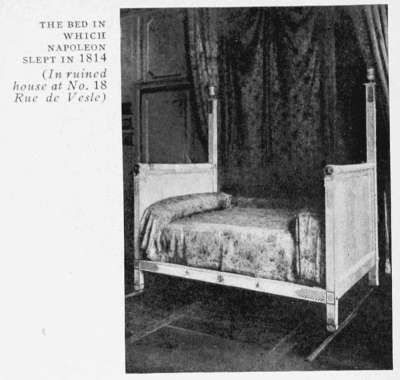 THE BED IN
WHICH
NAPOLEON
SLEPT IN 1814
(In ruined
house at No. 18
Rue de Vesle.)
