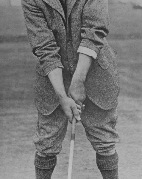 PLATE I.

HARRY VARDON'S GRIP

Showing the overlapping of the first finger of the left hand by the
little finger of the right. This is now the orthodox grip.