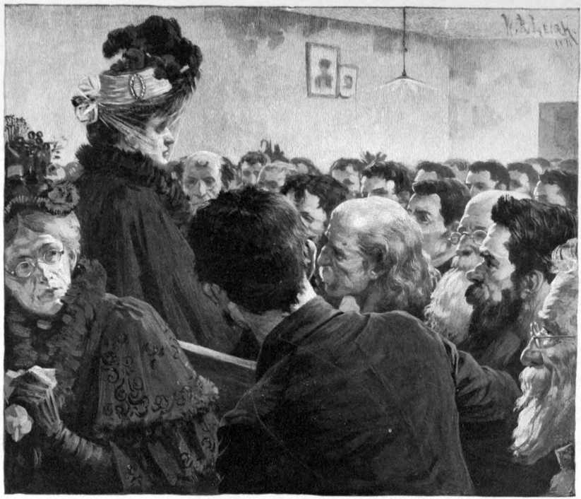 A room full of people sitting in pews.
One woman is walking back down the aisle.